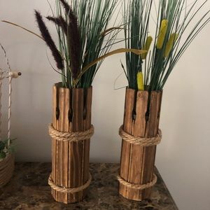 2 wooden  vases with flowers